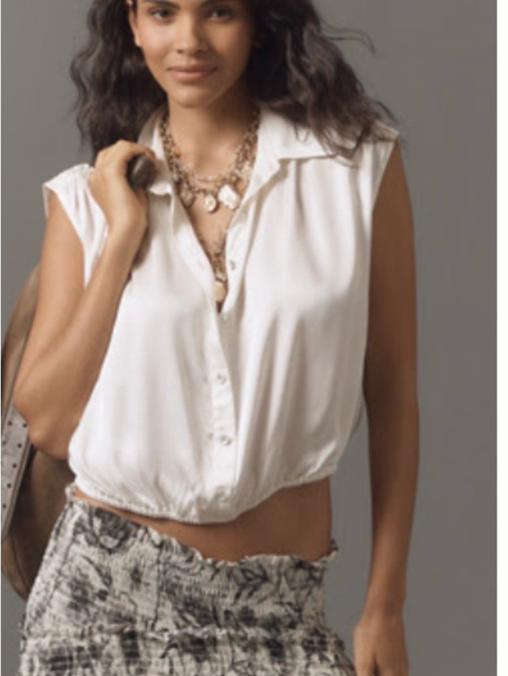 Sleeveless White Button-Front Crop Blouse